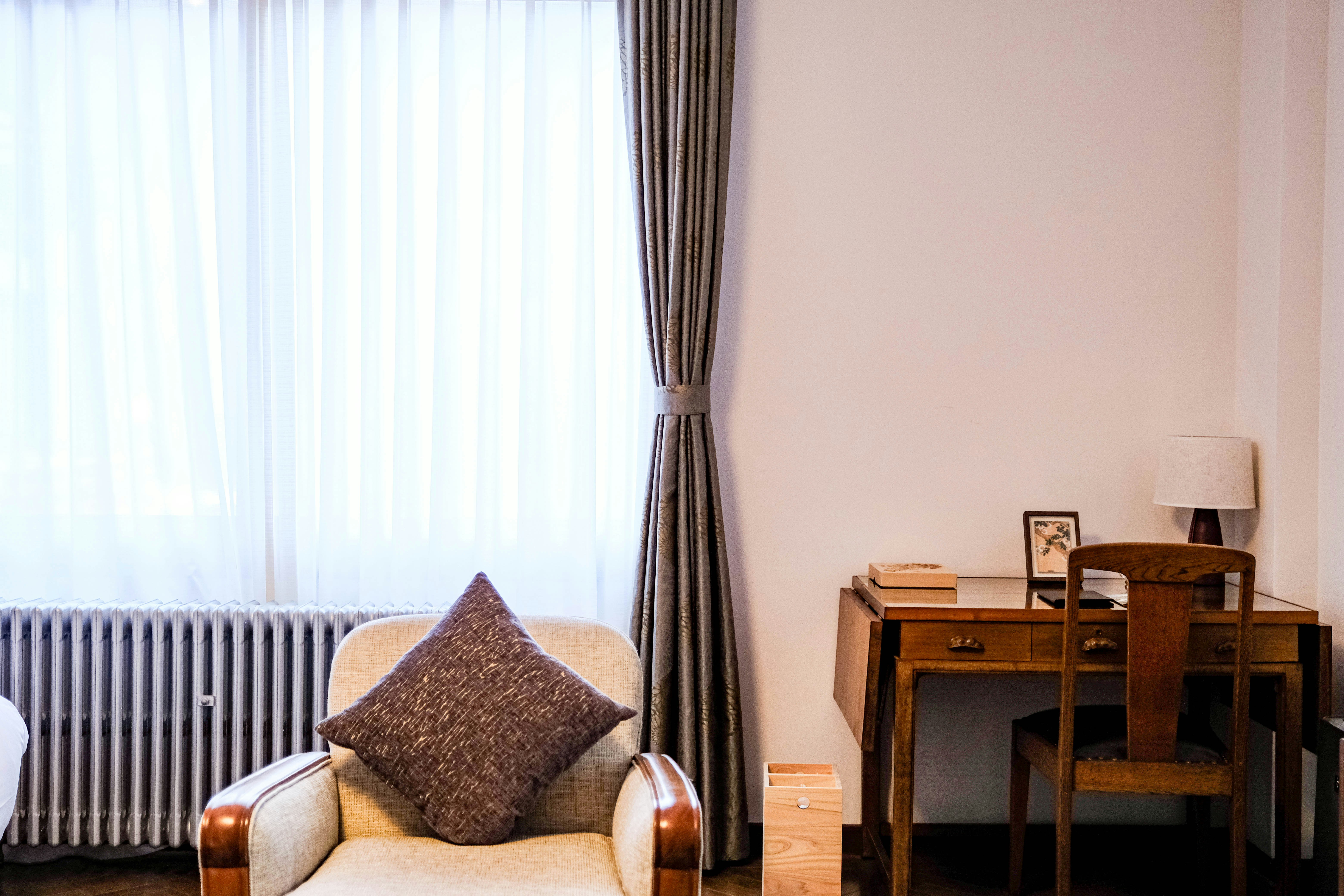hotel room with chair and desk