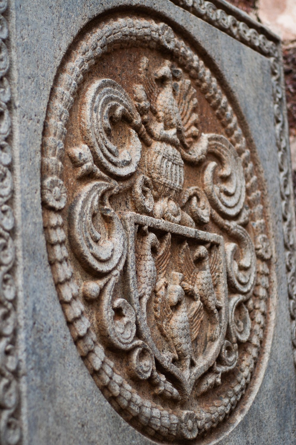 a close up of a decorative object on a wall
