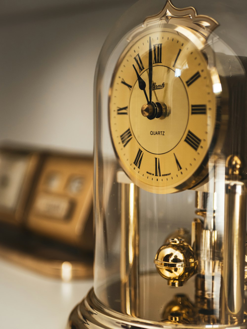 a clock that is inside of a glass case