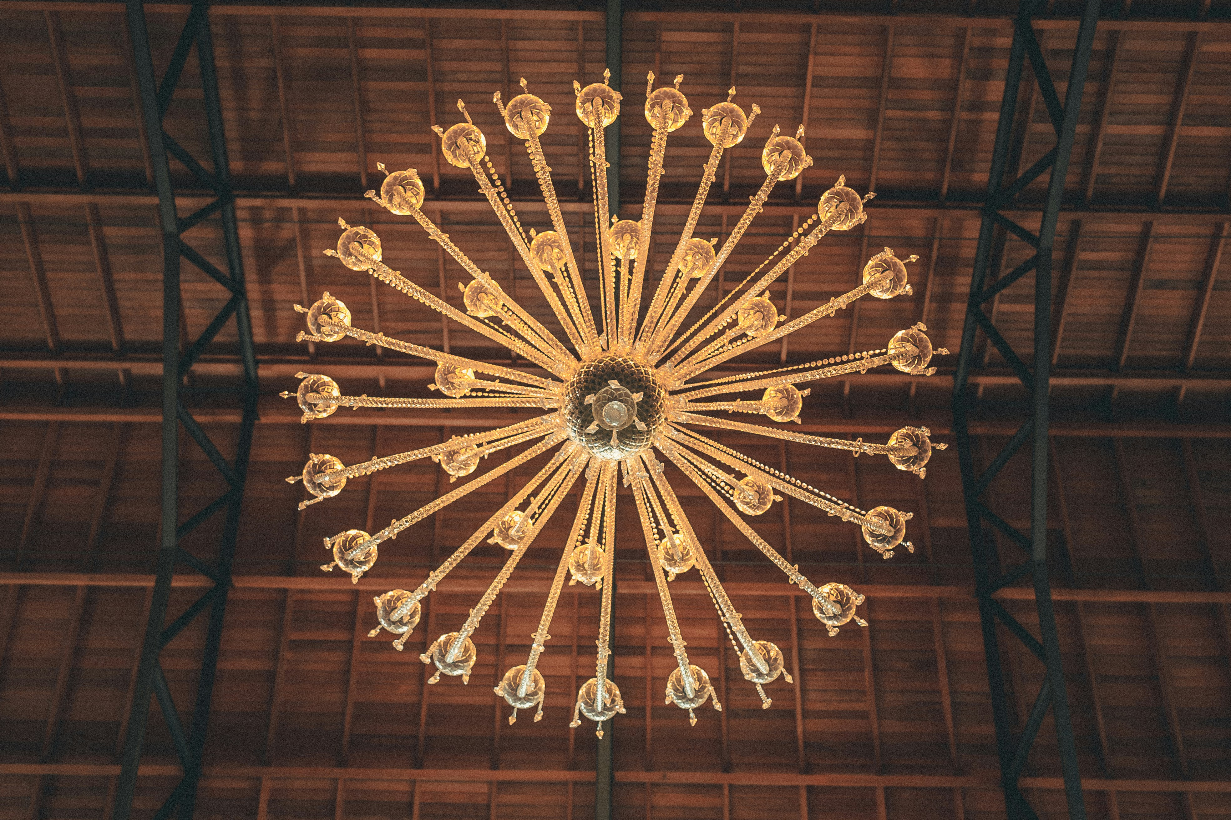a chandelier hanging from the ceiling of a building