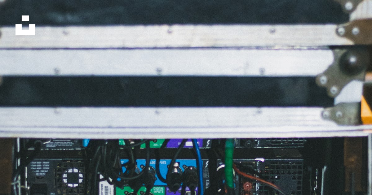 A stack of electronic equipment sitting on top of each other photo ...