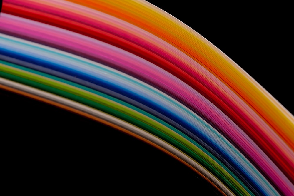 a close up of a rainbow colored object