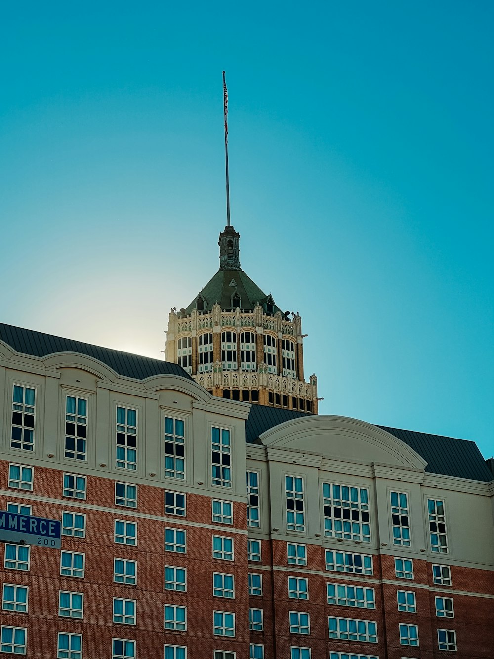 a tall building with a clock on the top of it