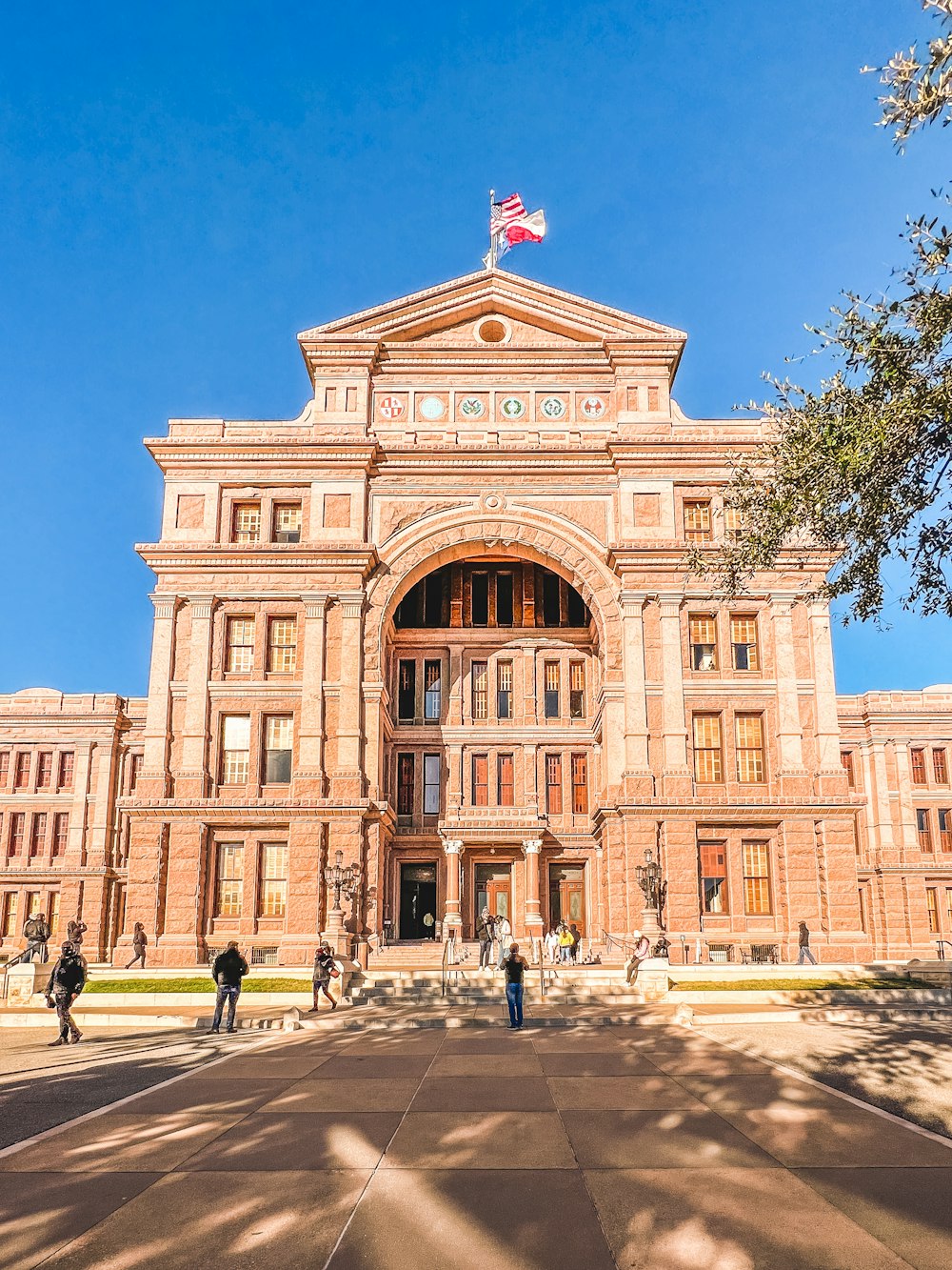 a large building with a flag on top of it