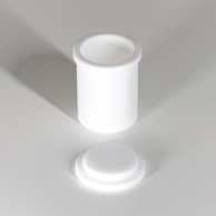 A white cylindrical container with a separate lid, both made of a smooth, opaque material. The container and lid are positioned on a light gray surface, casting soft shadows.