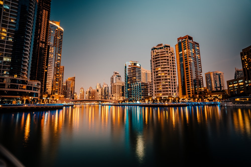 a body of water surrounded by tall buildings