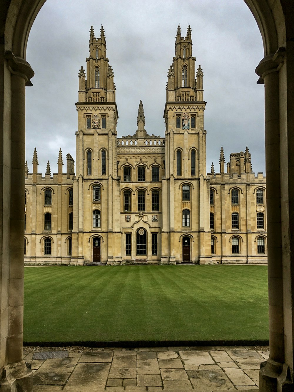 a large building with a large lawn in front of it