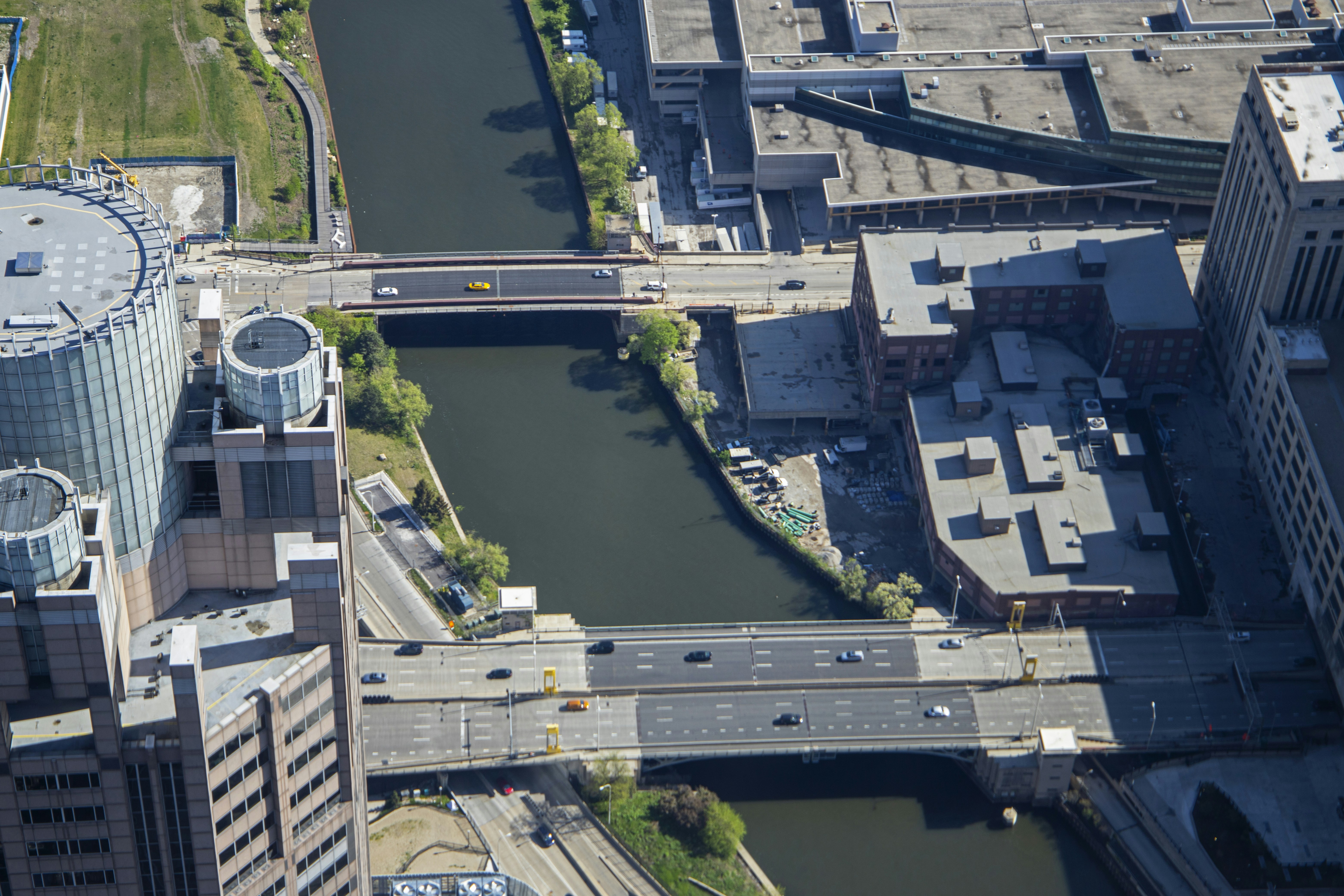of the Chicago Riverwalk on a sunny day, viewed from above - luxury apartments downtown