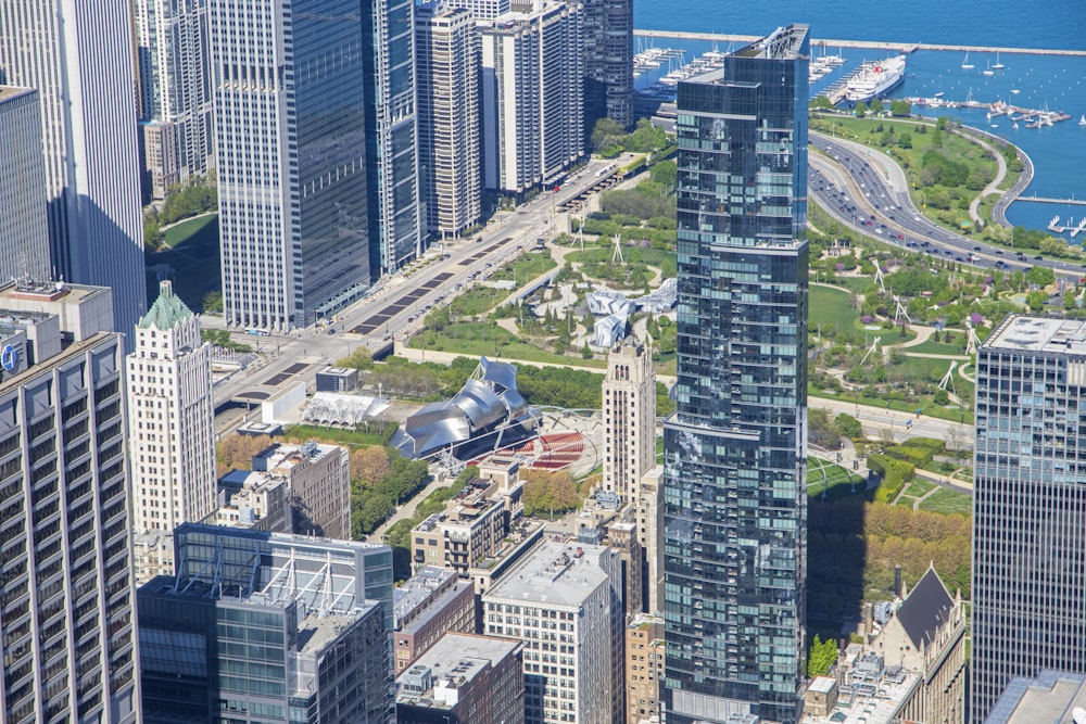 an aerial view of a city with tall buildings