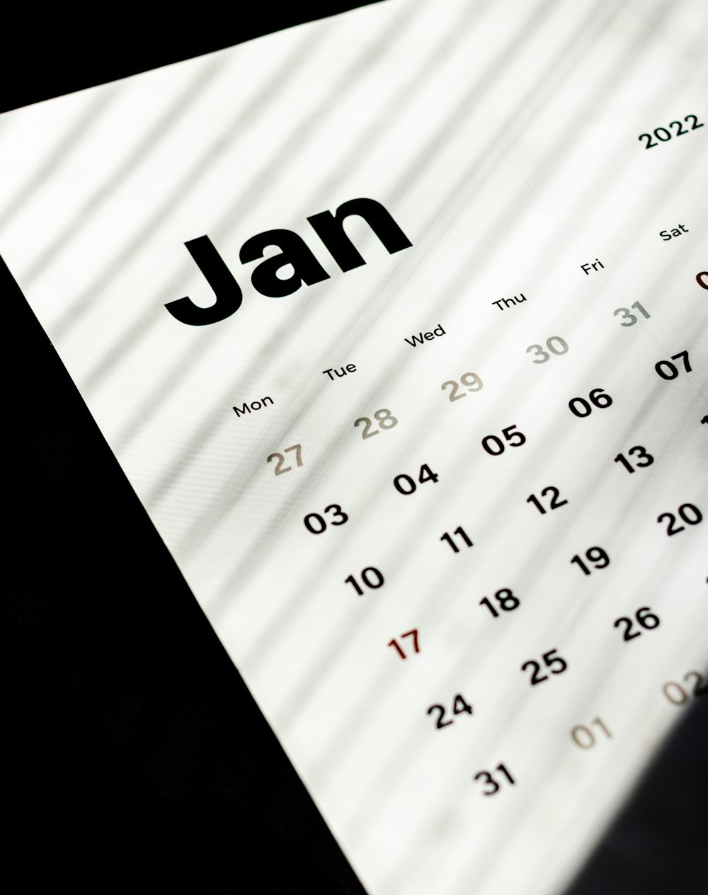 a close up of a calendar with the word jan on it