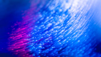 a close up of a blue and red background