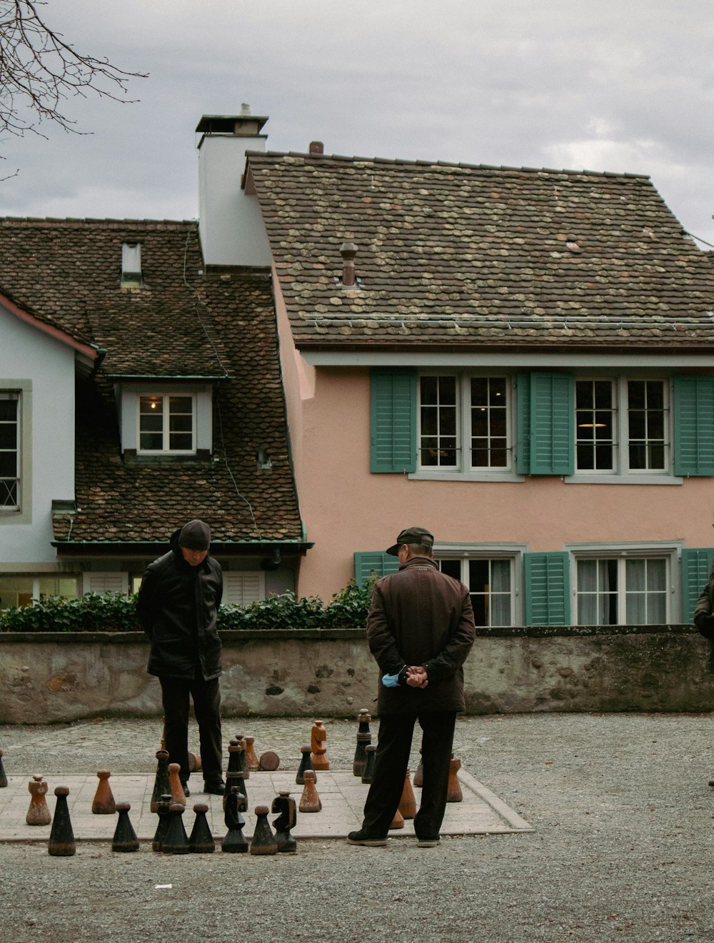 a group of men playing a game of chess