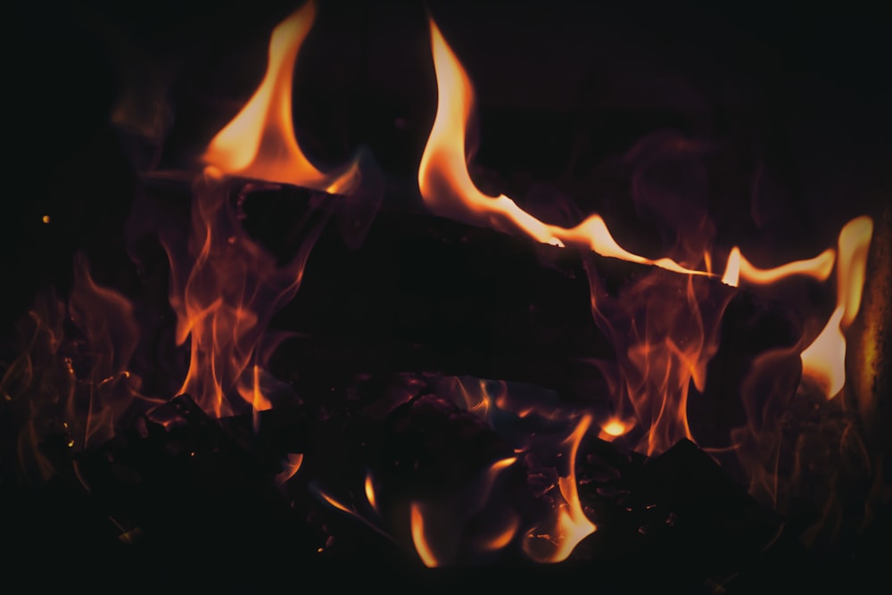 a close up of a fire in a fireplace