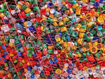 a large amount of plastic bottles in a cage