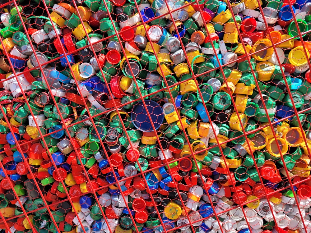 a large amount of plastic bottles in a cage