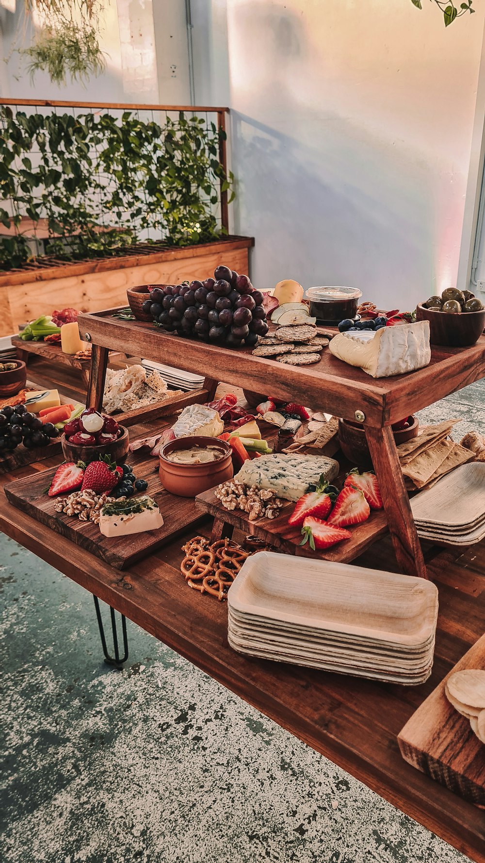 a wooden table topped with lots of food