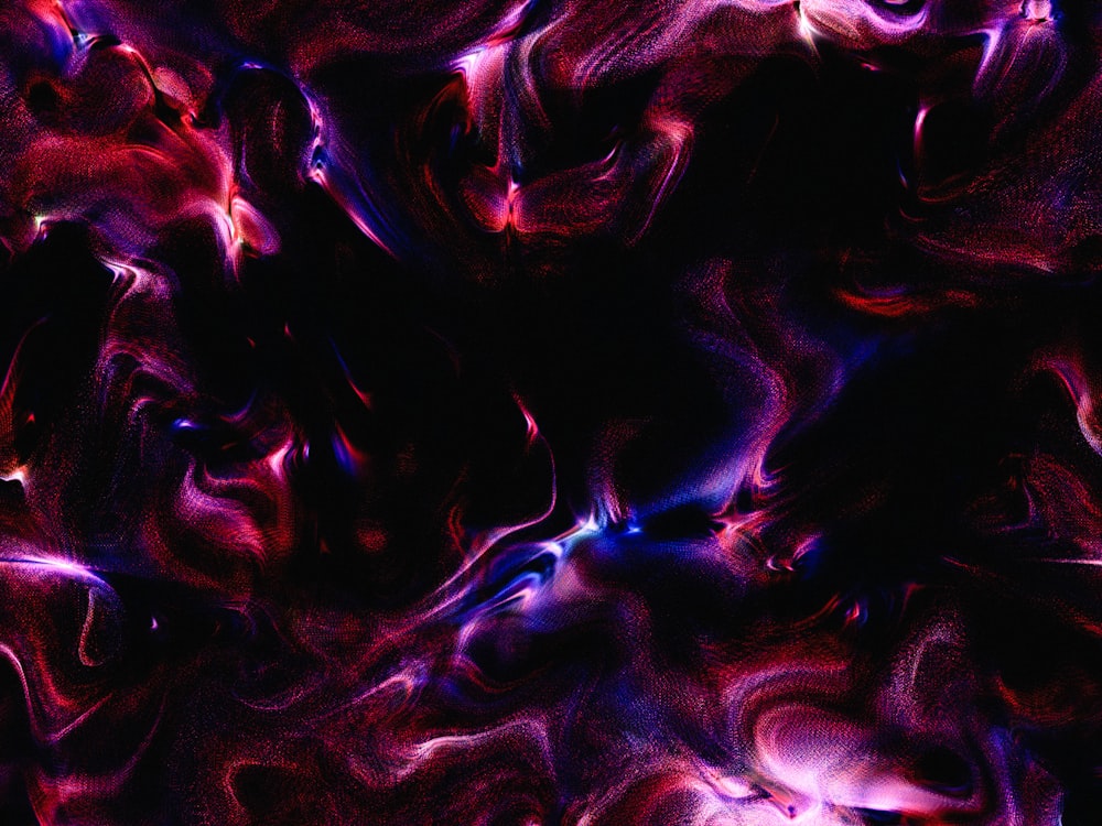 a purple and red abstract background with a black background