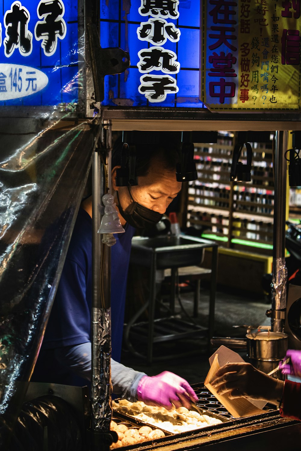 a man working on a keyboard in a store