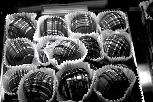 a bunch of chocolates are in a box