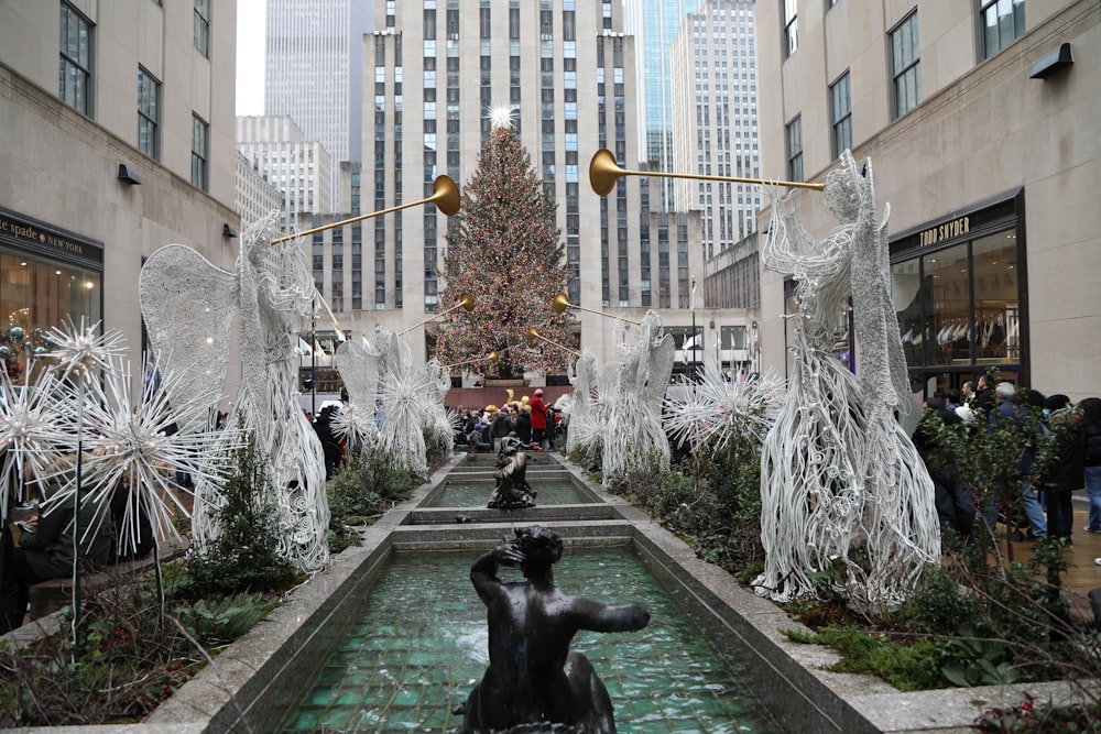 a christmas tree in the middle of a city