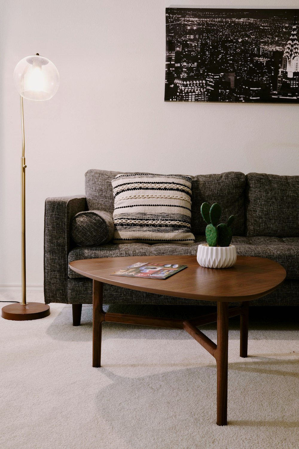 a living room with a couch and a table