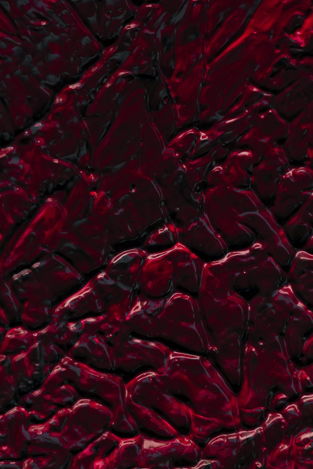 a close up of a red background with rocks
