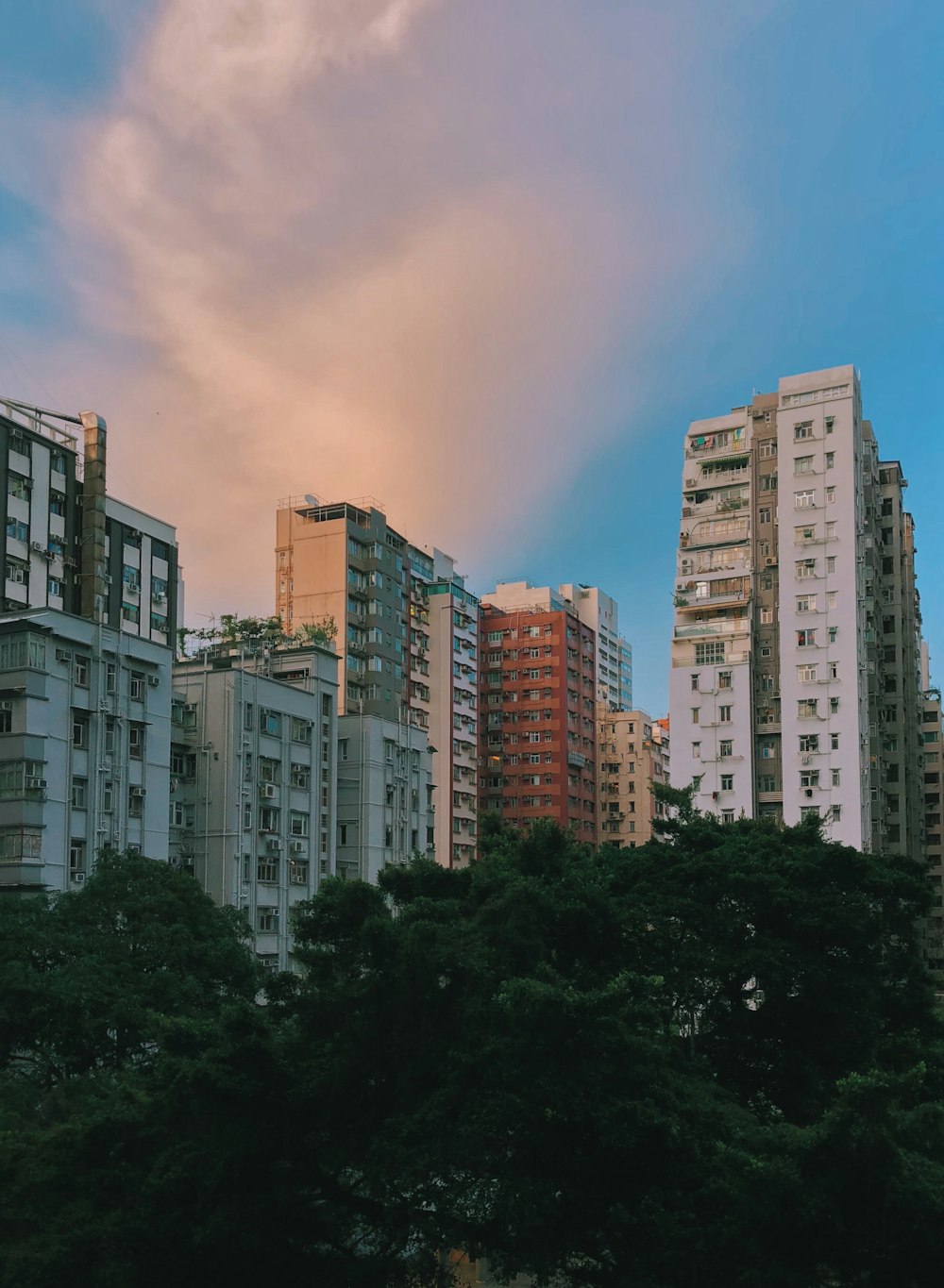 a group of tall buildings sitting next to each other