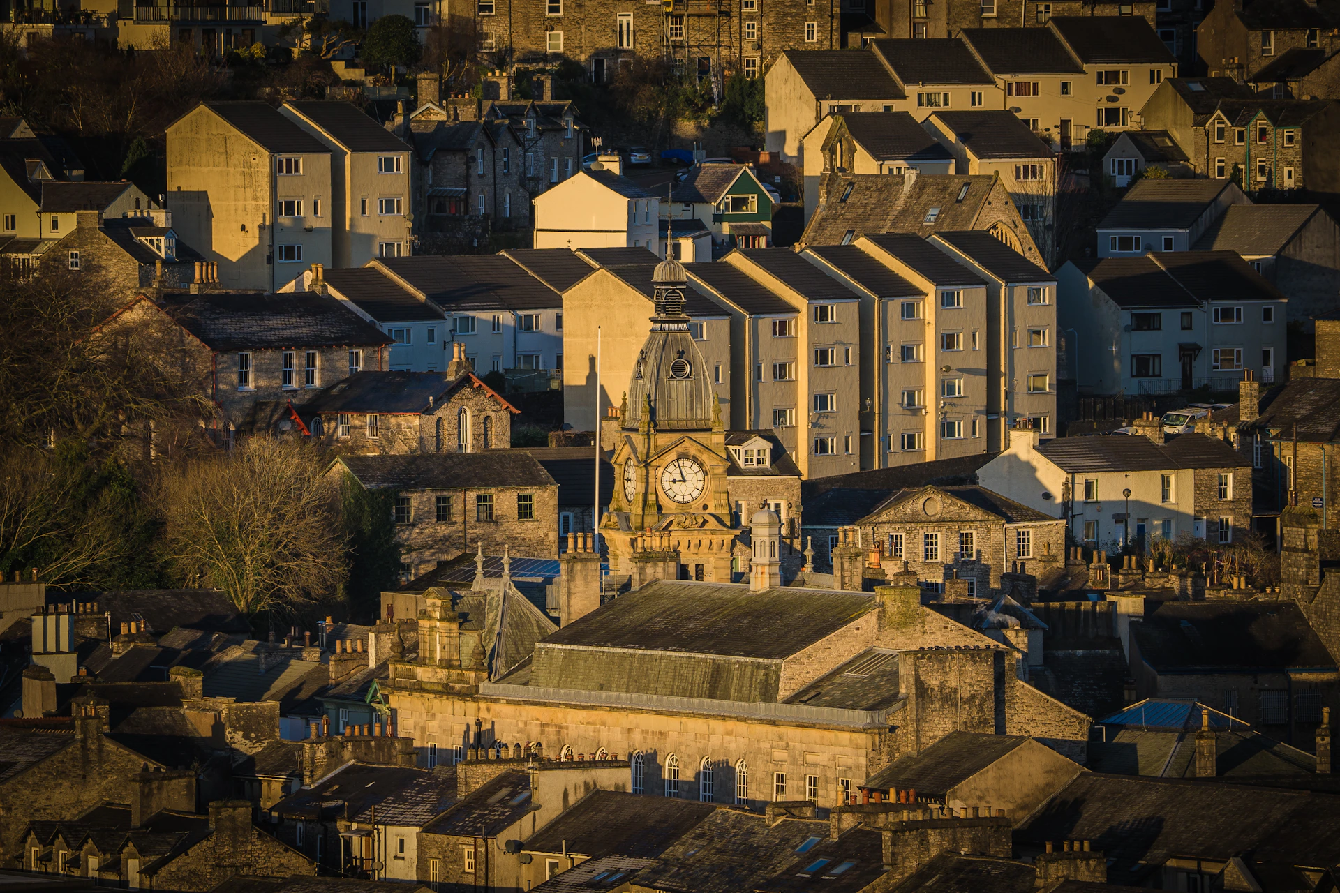 A vibrant painting of Vernier's historic town square bathed in warm afternoon light.