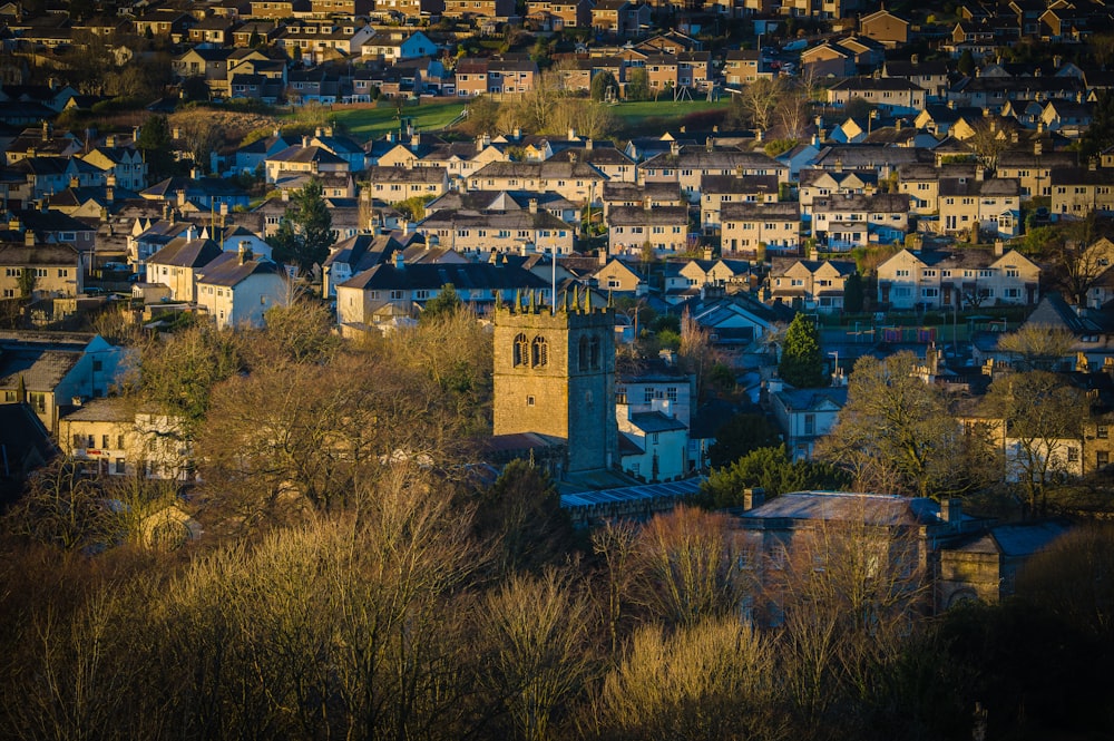 a view of a small town with a clock tower