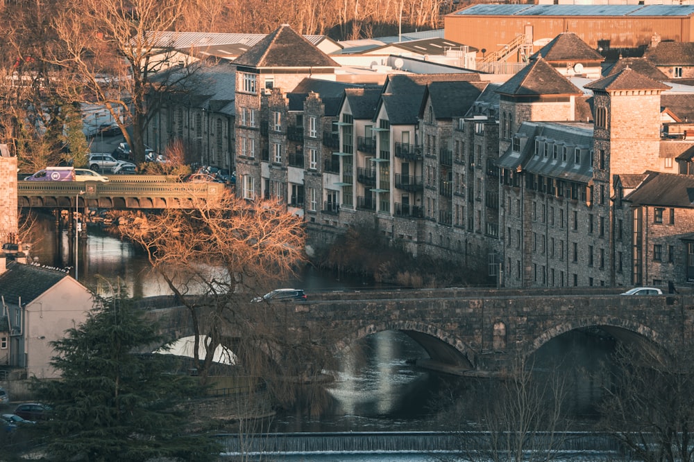 a bridge over a river in a city