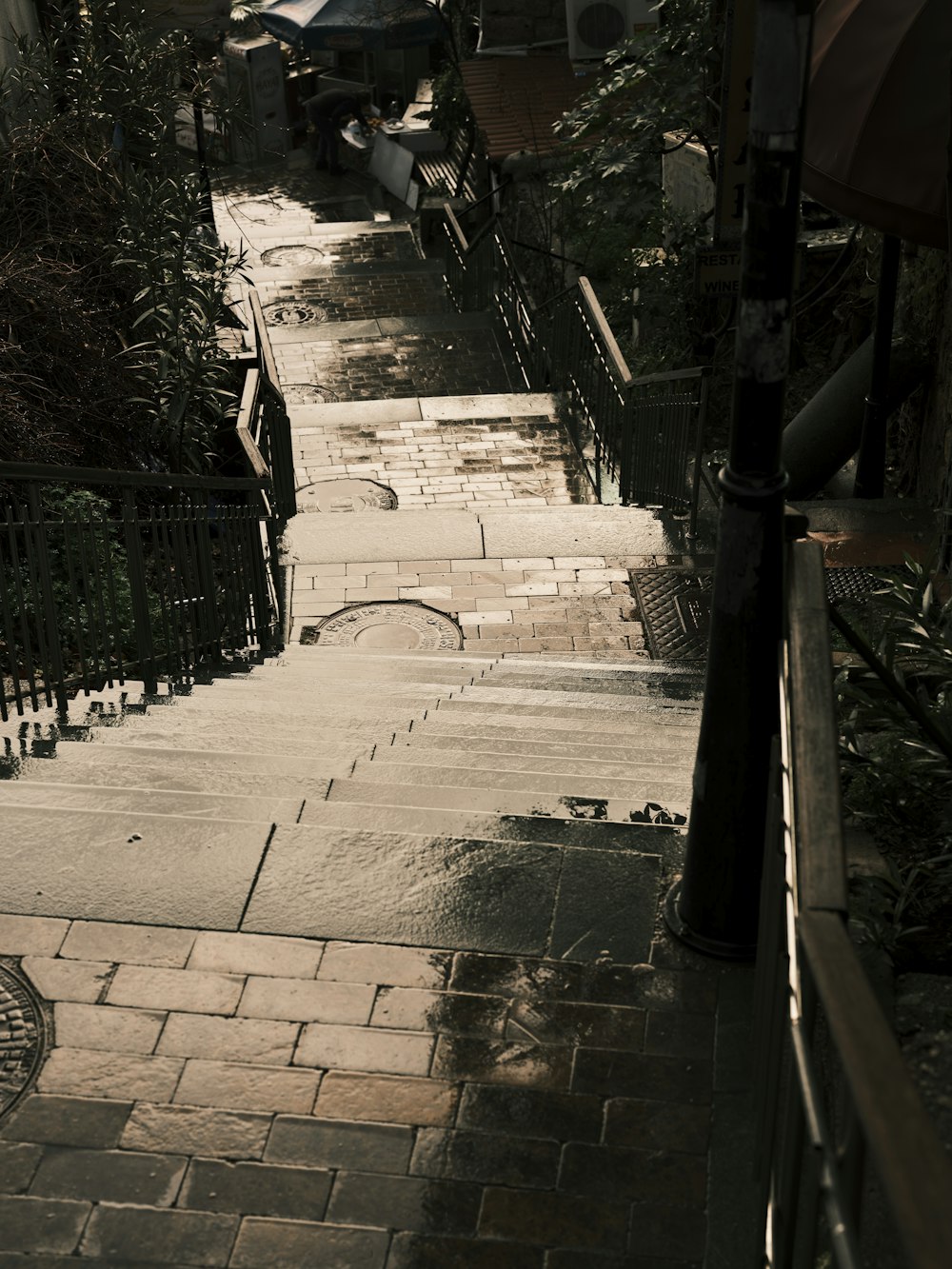 a view of a walkway with a clock on it