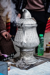 a large silver object sitting on top of a table