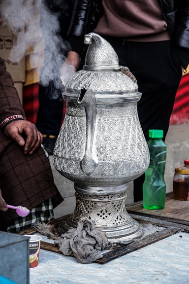 a large silver object sitting on top of a table