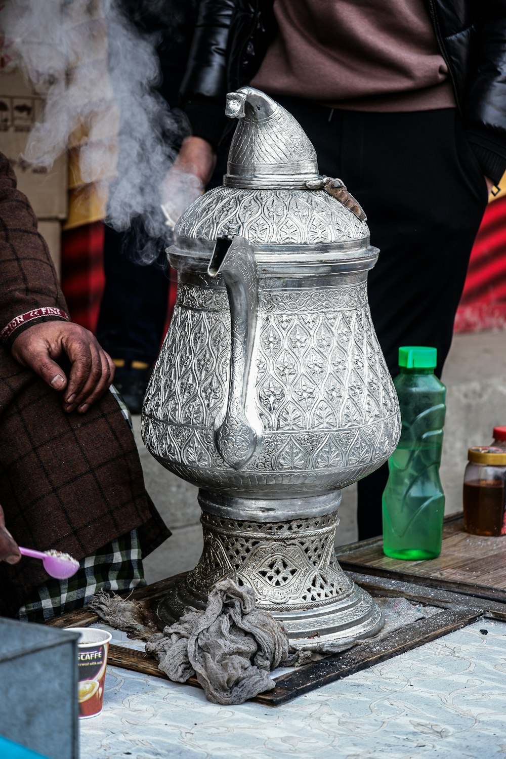 a large silver object sitting on top of a table