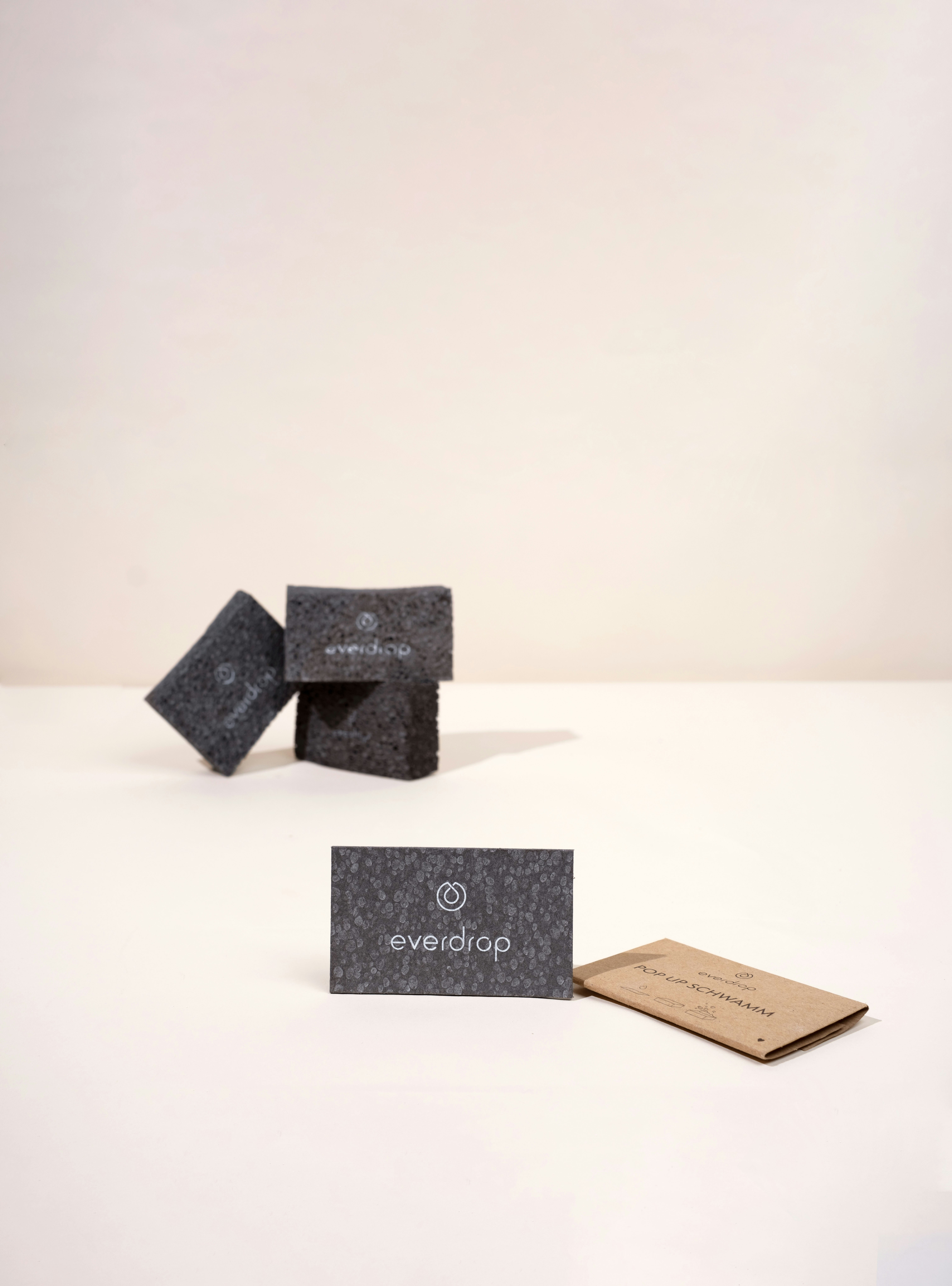 a business card sitting on top of a white table