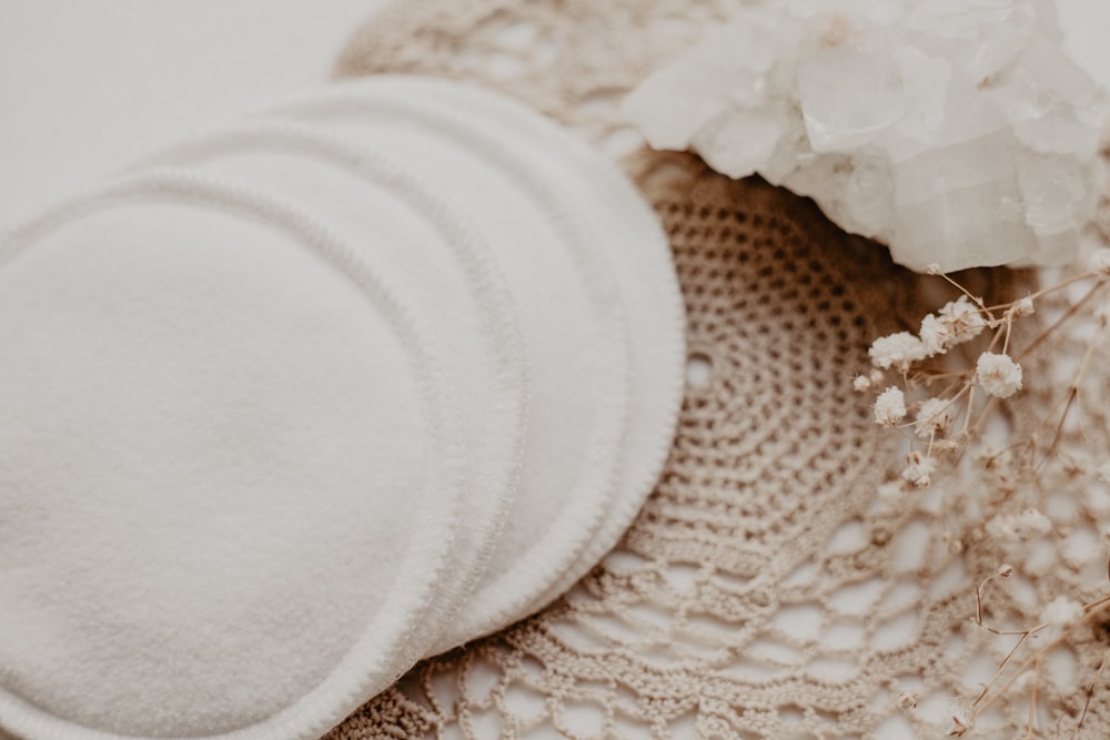 a close up of a hat with flowers on it