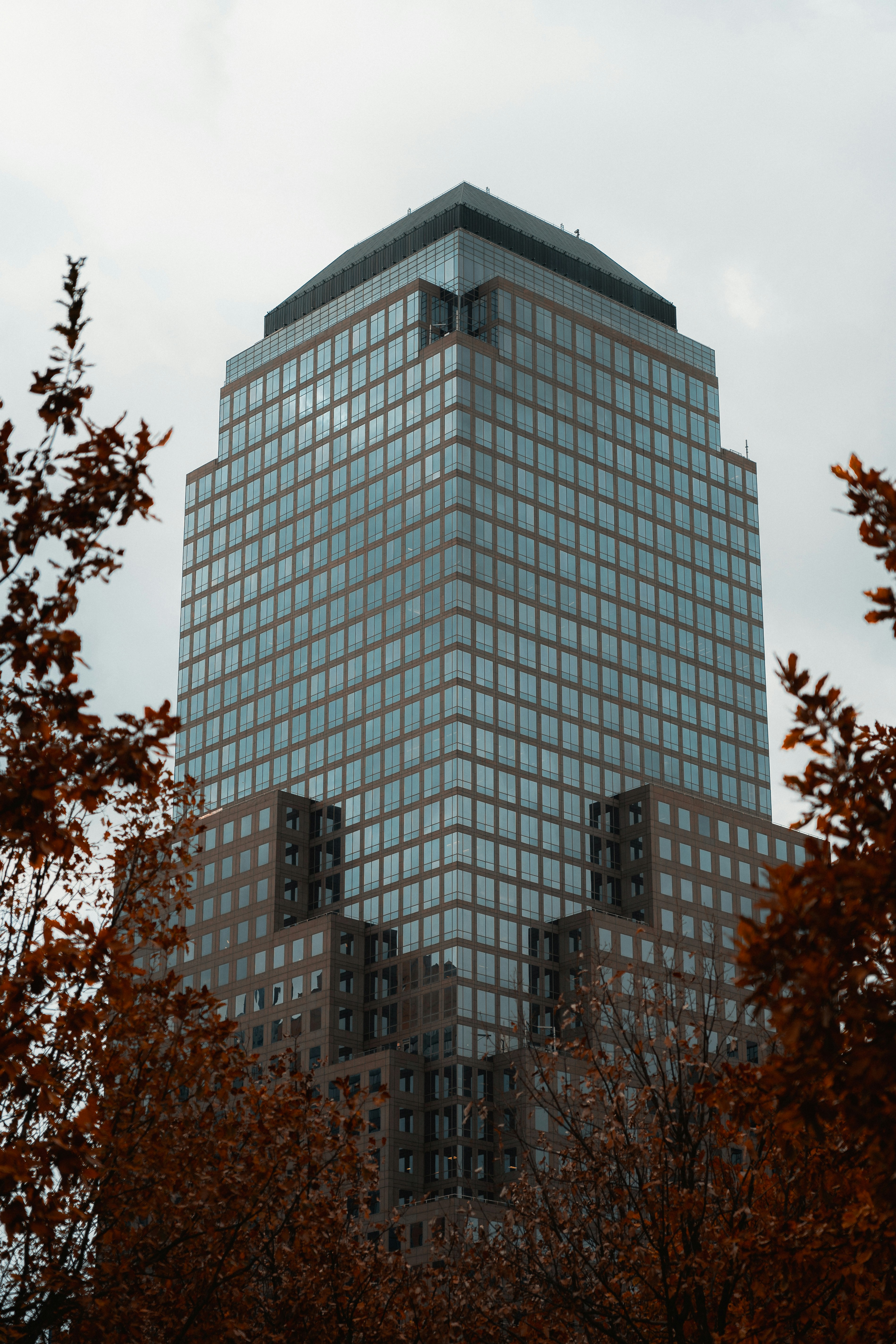 a very tall building with a clock on it's side