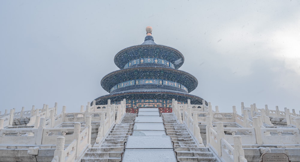 a very tall building with a lot of stairs going up it