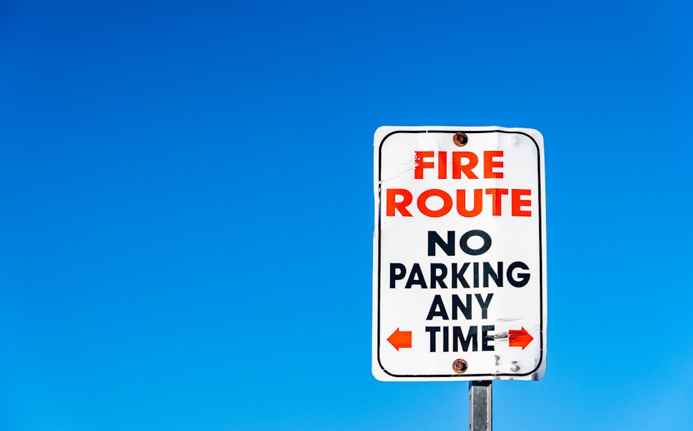 a fire route no parking any time sign