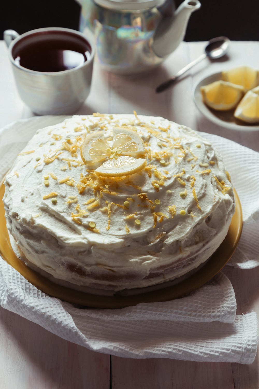 a cake sitting on top of a white table