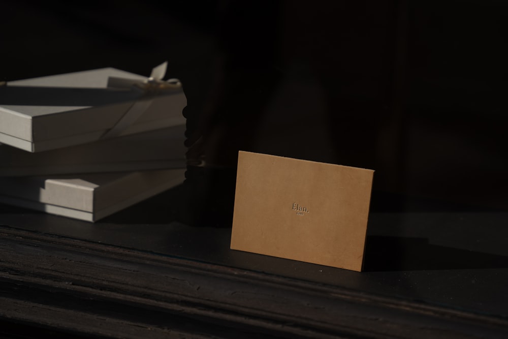 a stack of books sitting on top of a table