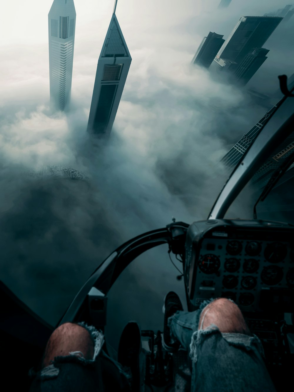 a man is sitting in the cockpit of a plane