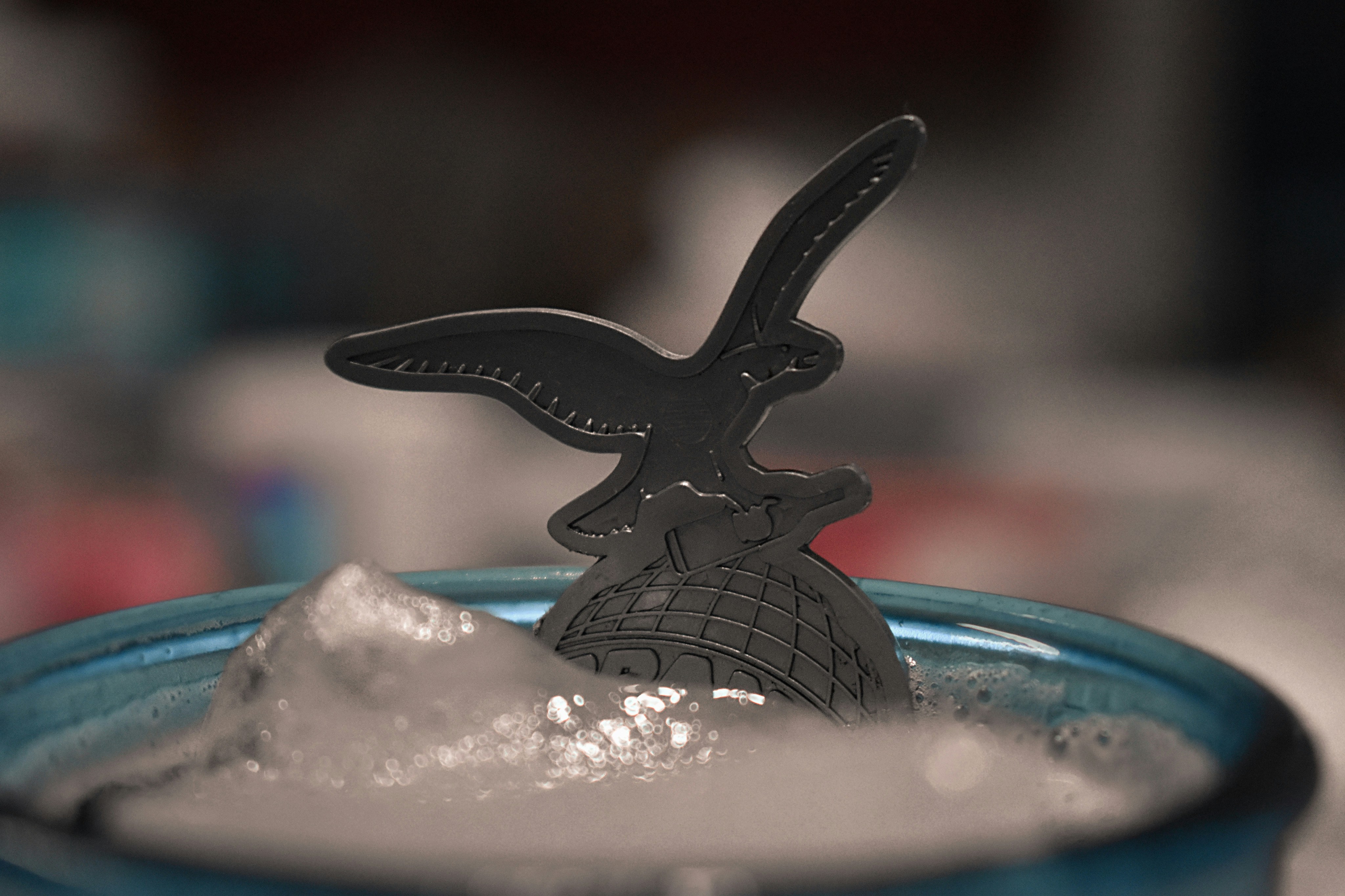 a bowl of sugar with a spoon sticking out of it