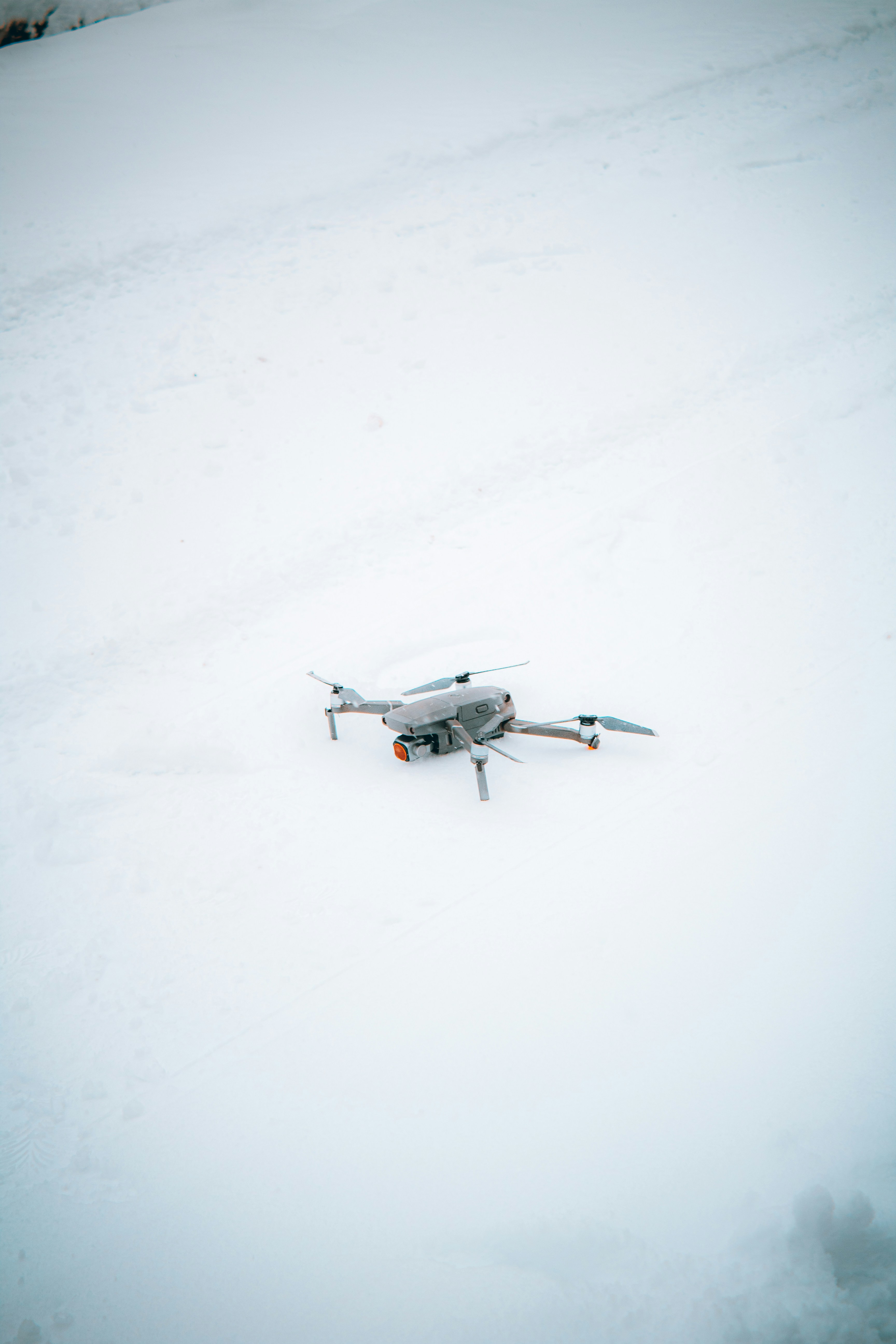 A small airplane sitting on top of a snow covered field photo – Free ...