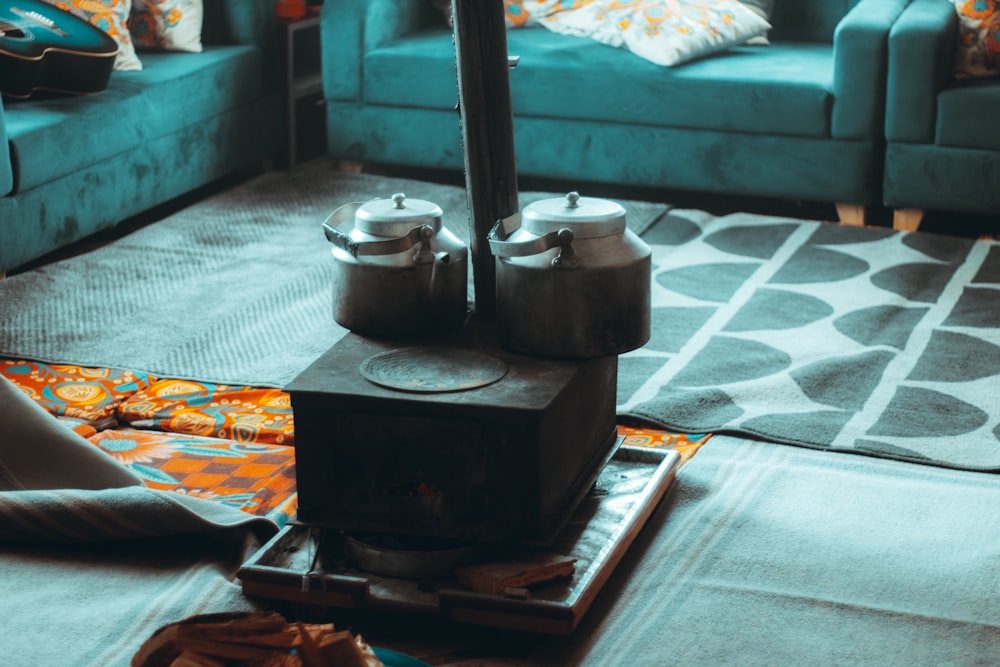 a living room filled with furniture and a blue couch