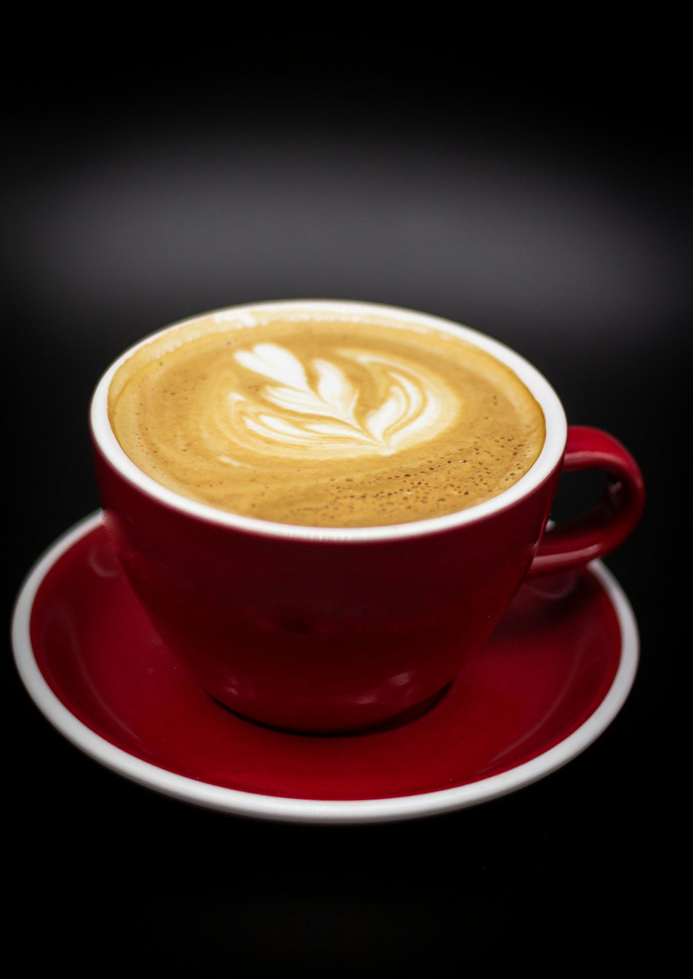 a cup of coffee on a saucer