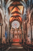 a cathedral with a large stained glass window