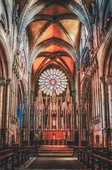 a cathedral with a large stained glass window