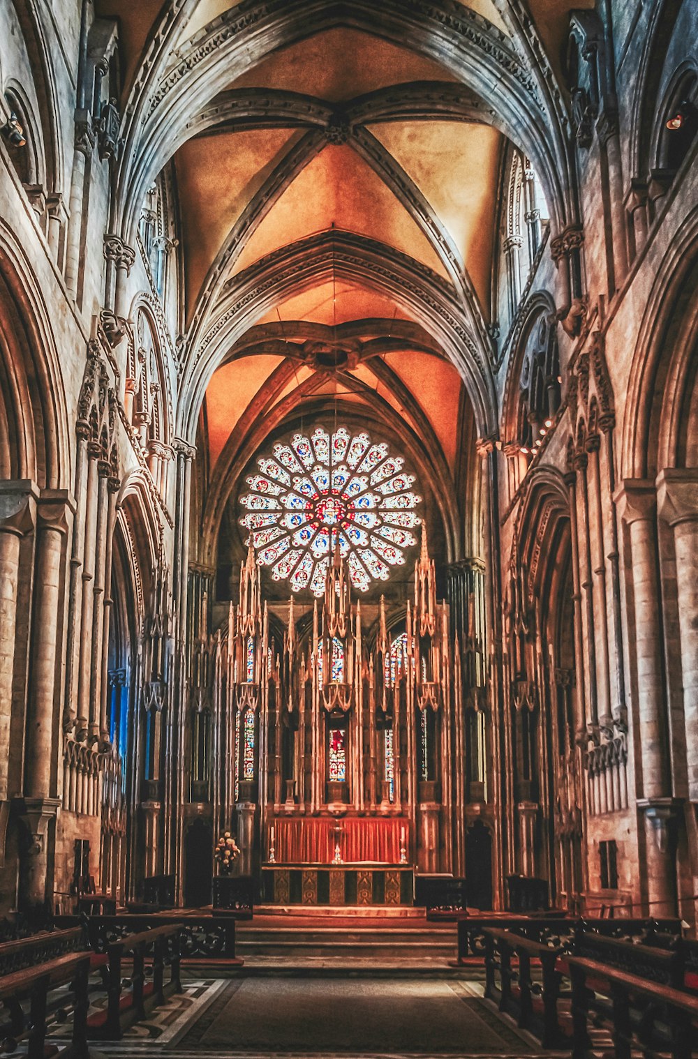 a cathedral with a large stained glass window