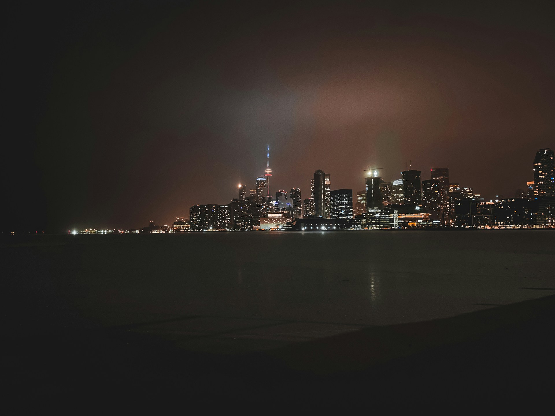 woman wearing yellow long-sleeved dress under white clouds and blue sky during daytime
